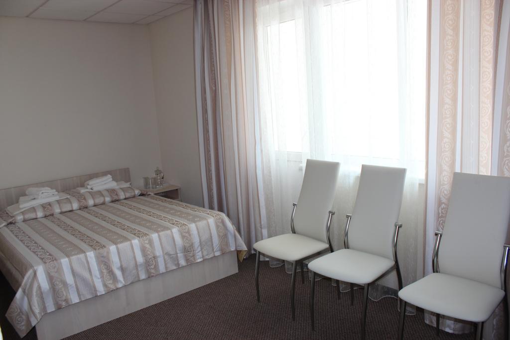 Bely Dom Hotel Krasnoyarsk Habitación foto